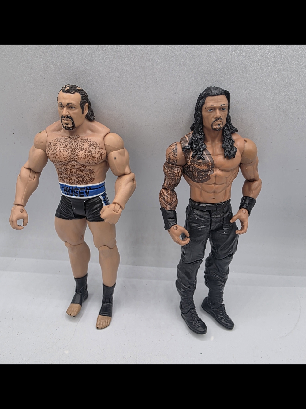 WWE Rusev And Roman Reigns Wrestling Figures 2013 And 2014
